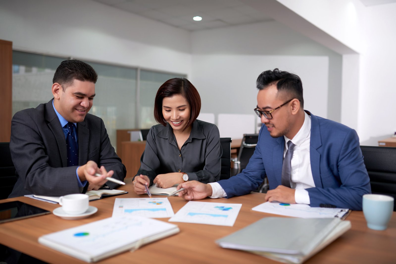 male female colleagues sitting office